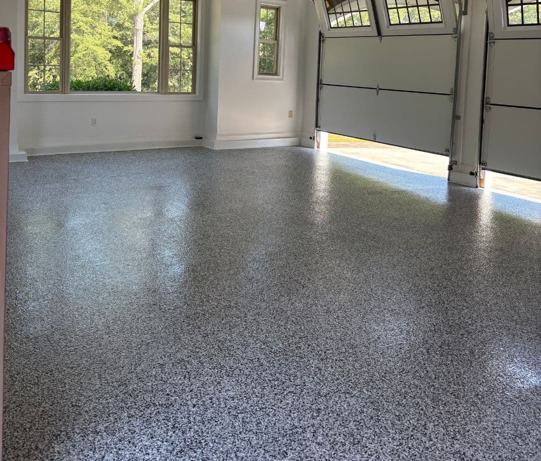 Residential garage floor with decorative epoxy flake coating